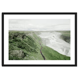 Tourists walking along the waterfall - Iceland thumbnail