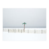 Fake palm tree in the winter snow beach (Print Only) thumbnail