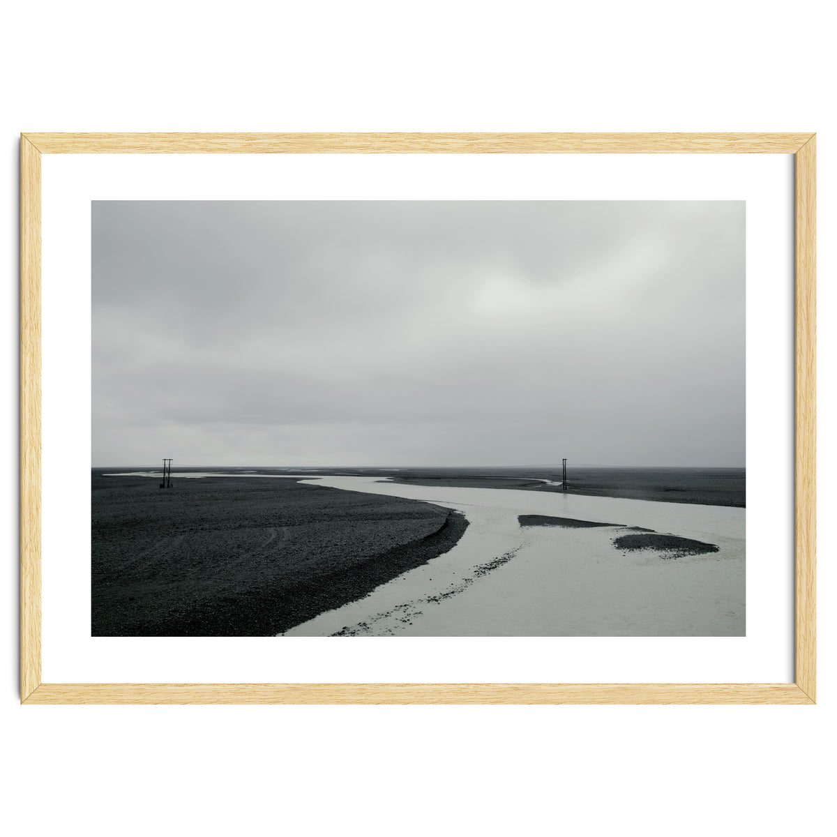 River passing through a black volcanic road - Iceland