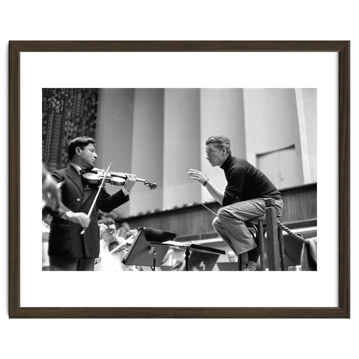 Conductor Herbert von Karajan rehearsing with Nathan Milstein in Lucerne, Switzerland. Lucerne,1957.