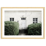 White door K between the green botanical gate thumbnail