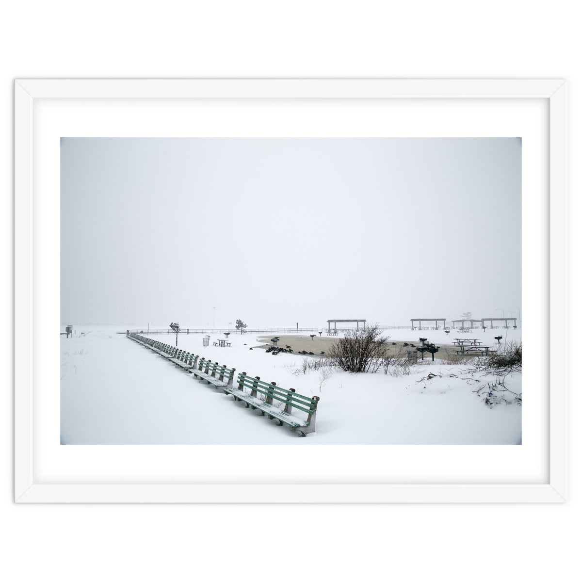 No people on a bench in the snowy winter