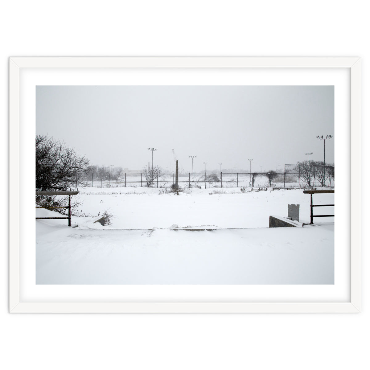 Baseball field covered in snow