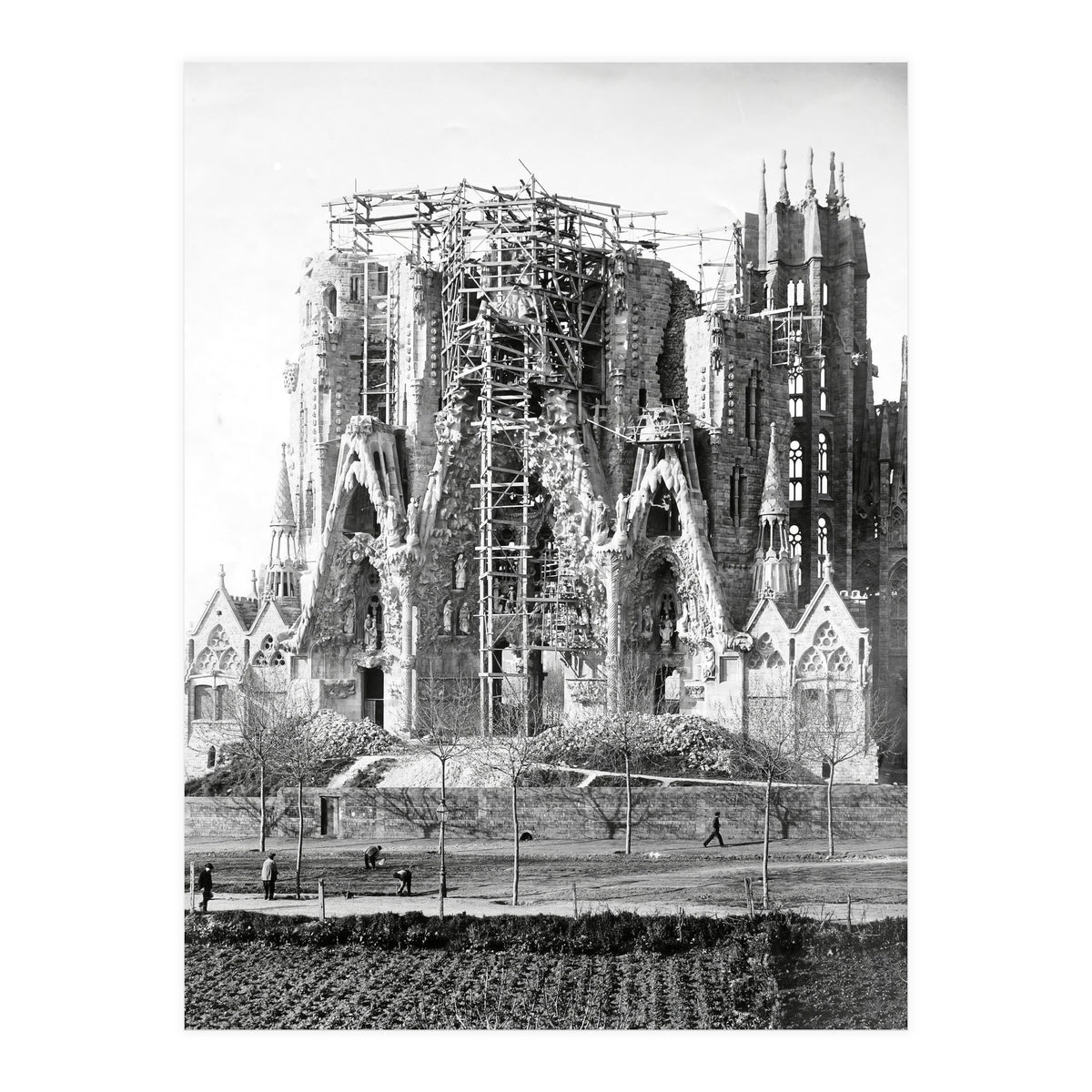 VIEW OF THE "SAGRADA FAMILIA" BASILICA BY ARCHITECT ANTONI GAUDI, PHOTOS OF WORK.  Ca. 1910. (Print Only)