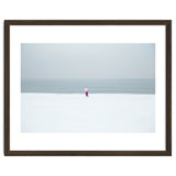 A walking woman in the winter snow beach thumbnail