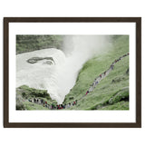 Tourists walking around the waterfall - Iceland thumbnail