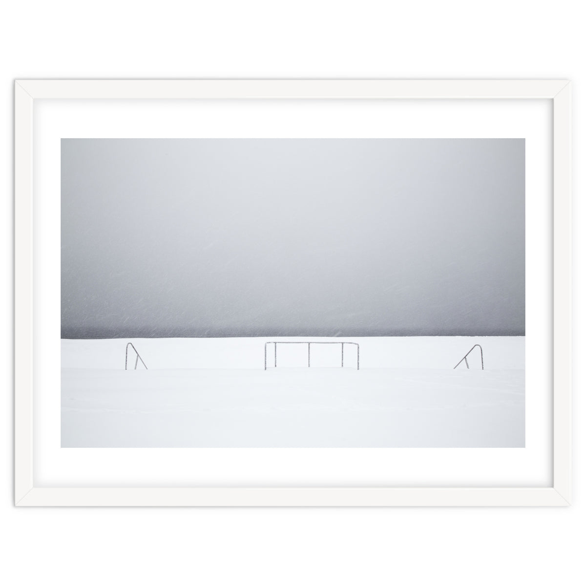 Stair railing covered by snow