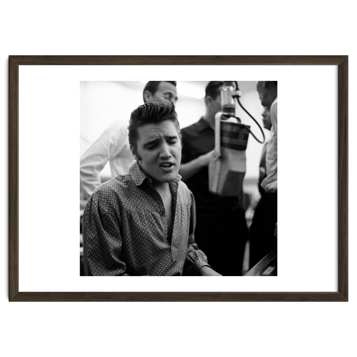 The American singer Elvis Presley during a recording session in 1956.