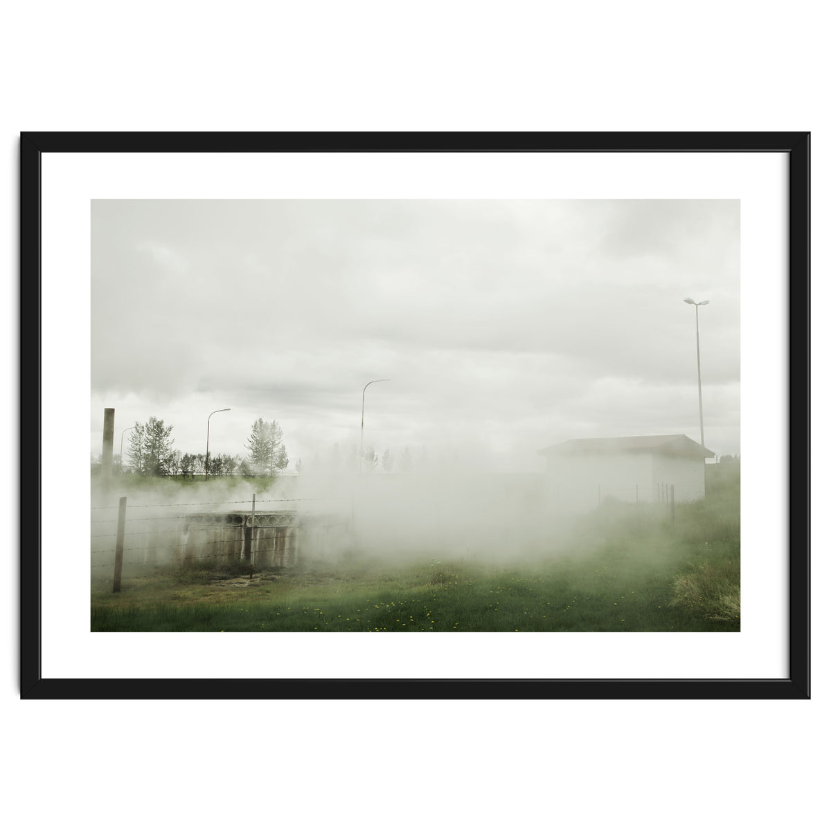 A source covered in steam from a hot spring - Iceland