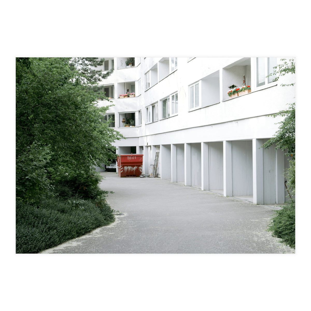 Red container in the residential site (Print Only)