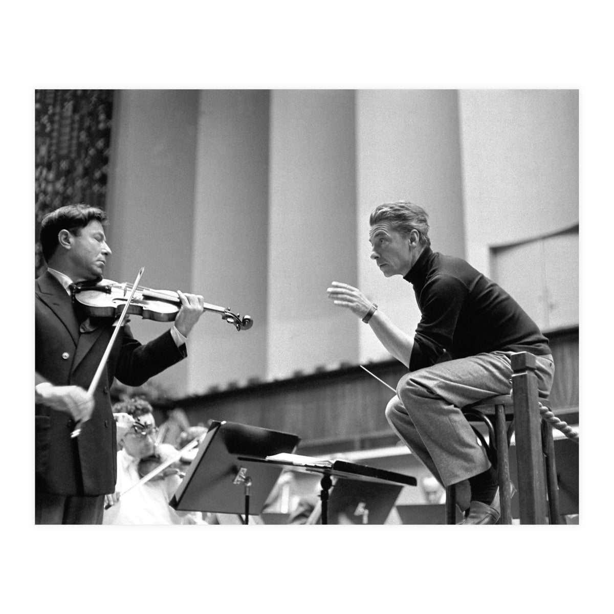 Conductor Herbert von Karajan rehearsing with Nathan Milstein in Lucerne, Switzerland. Lucerne,1957. (Print Only)