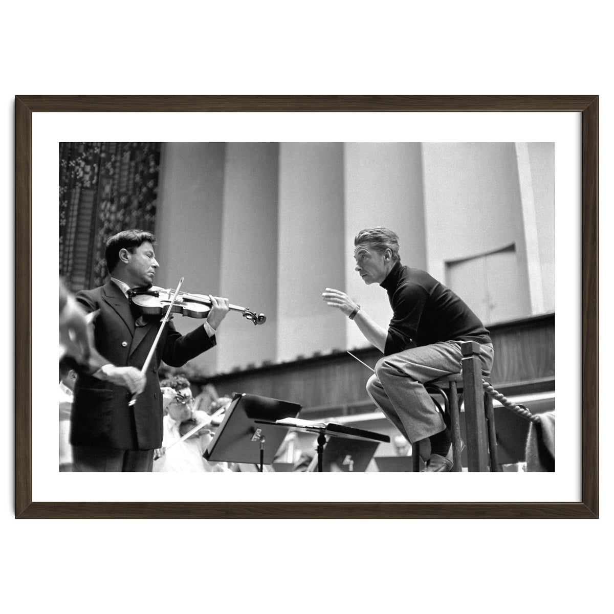 Conductor Herbert von Karajan rehearsing with Nathan Milstein in Lucerne, Switzerland. Lucerne,1957.
