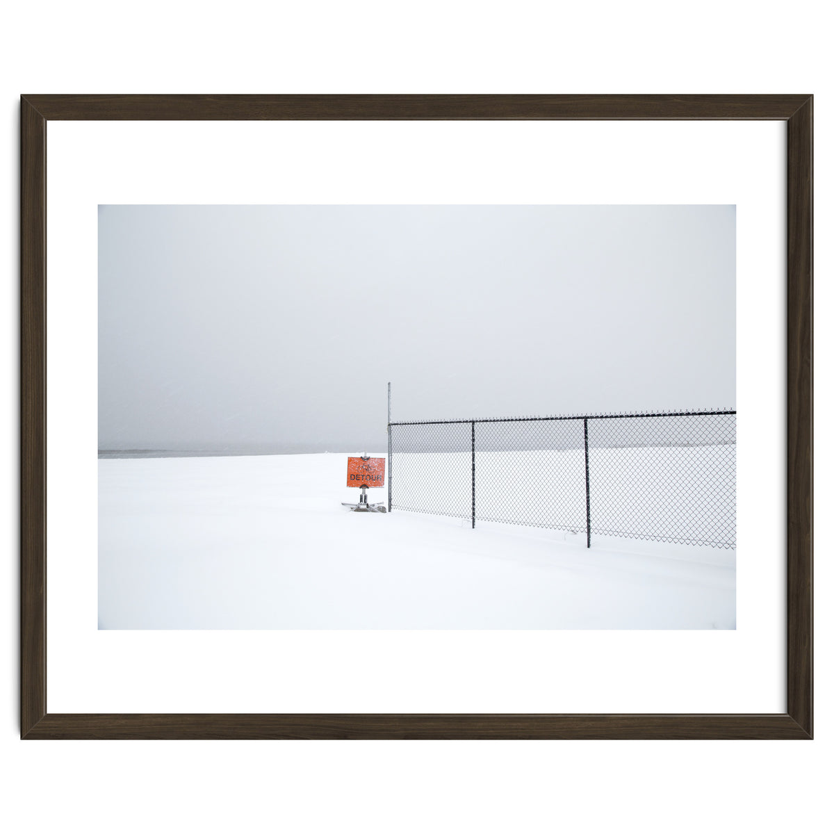 Detour sign in the snow beach