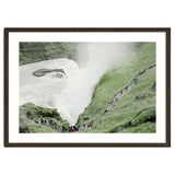 Tourists walking around the waterfall - Iceland thumbnail