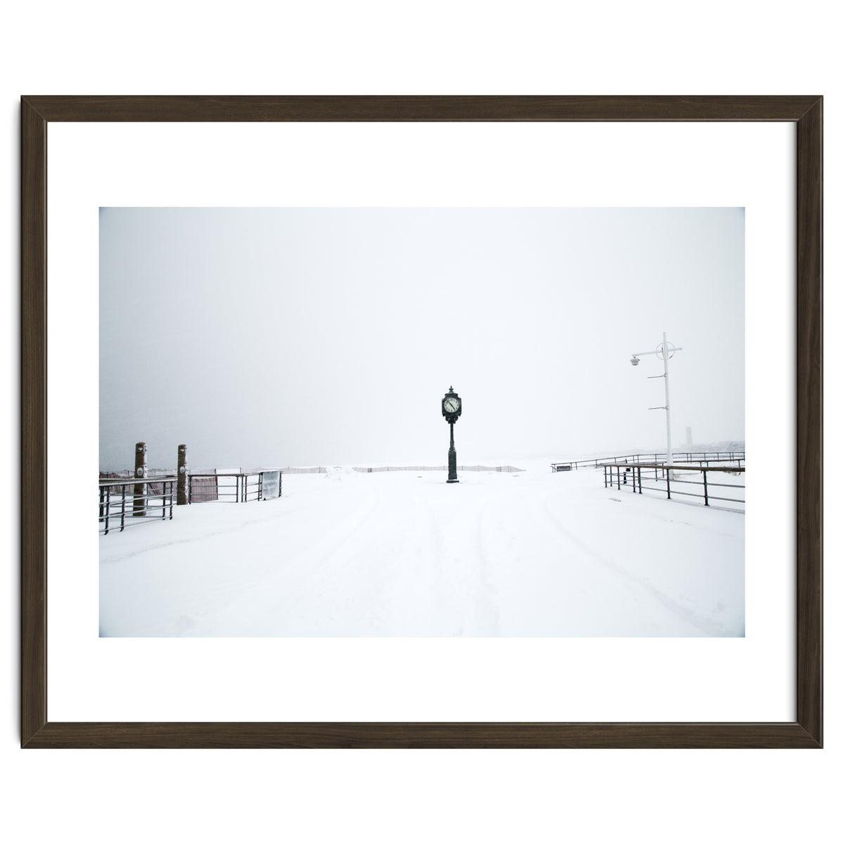 A clock tower in the snow beach