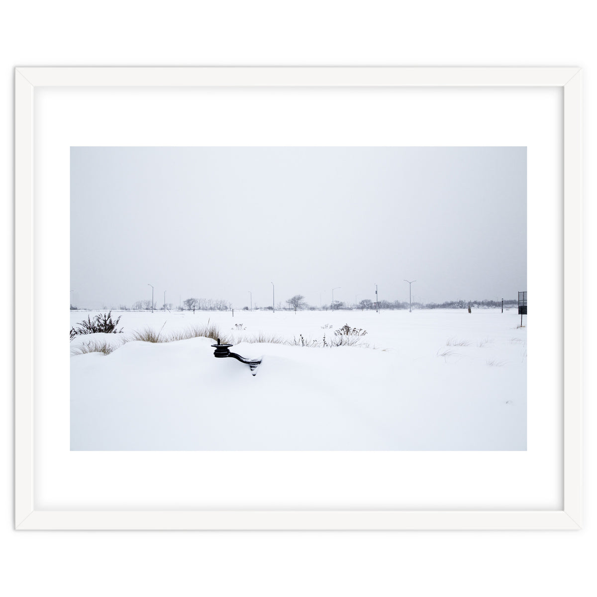 Drinking fountain covered with snow