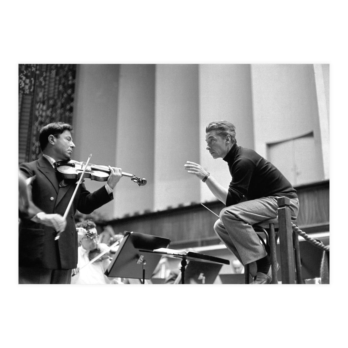 Conductor Herbert von Karajan rehearsing with Nathan Milstein in Lucerne, Switzerland. Lucerne,1957. (Print Only)