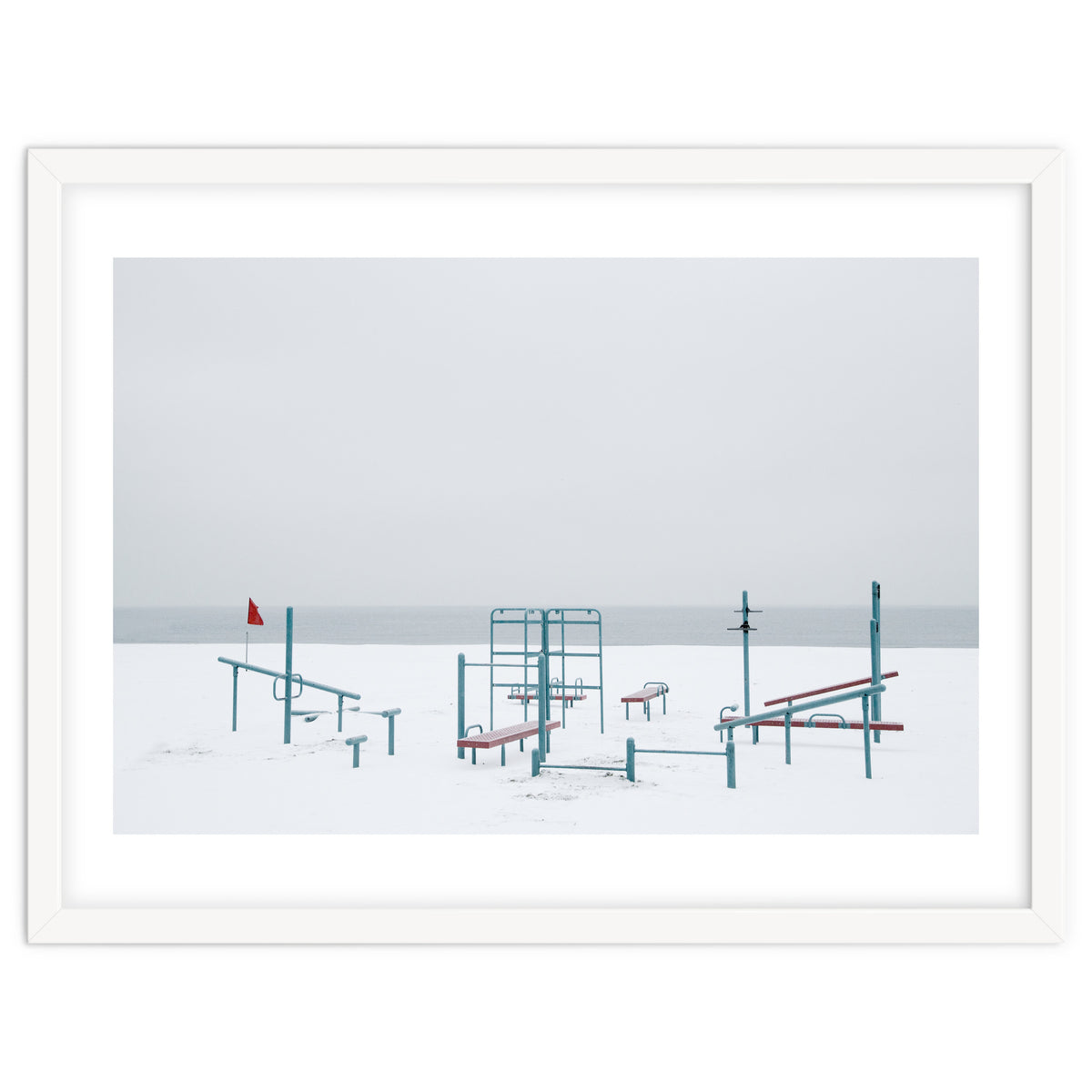 Playground in the winter snow beach