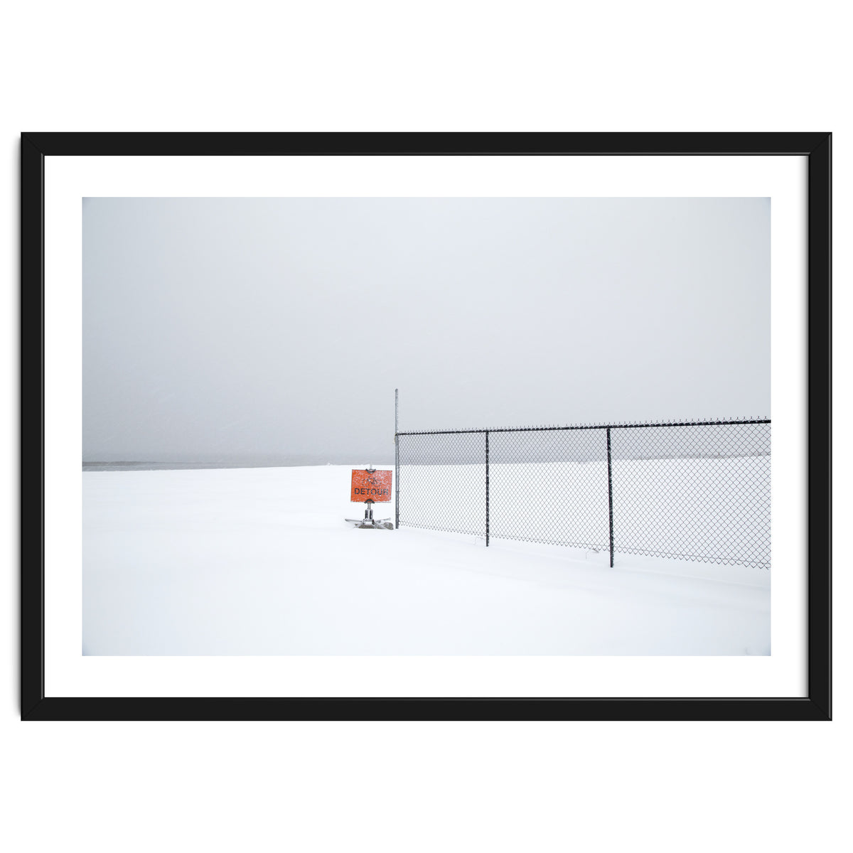 Detour sign in the snow beach