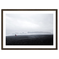 Family walking on the black sand beach - Iceland