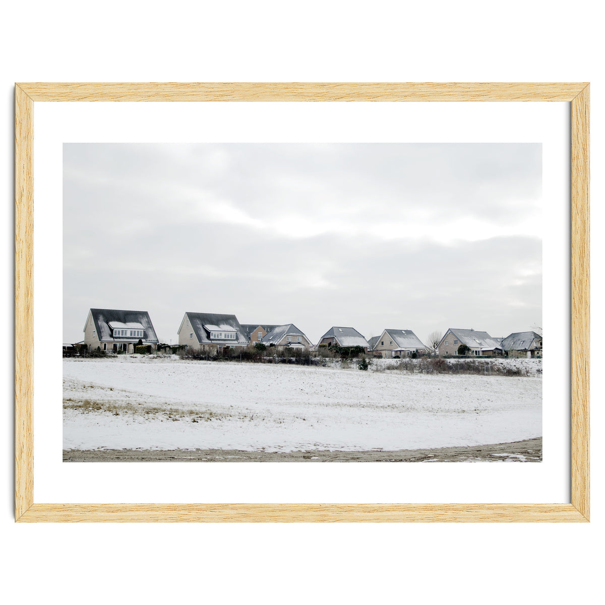 Snow covered houses on the hill