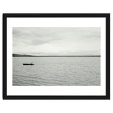 A boy pedaling the Board on the Lake - Iceland thumbnail