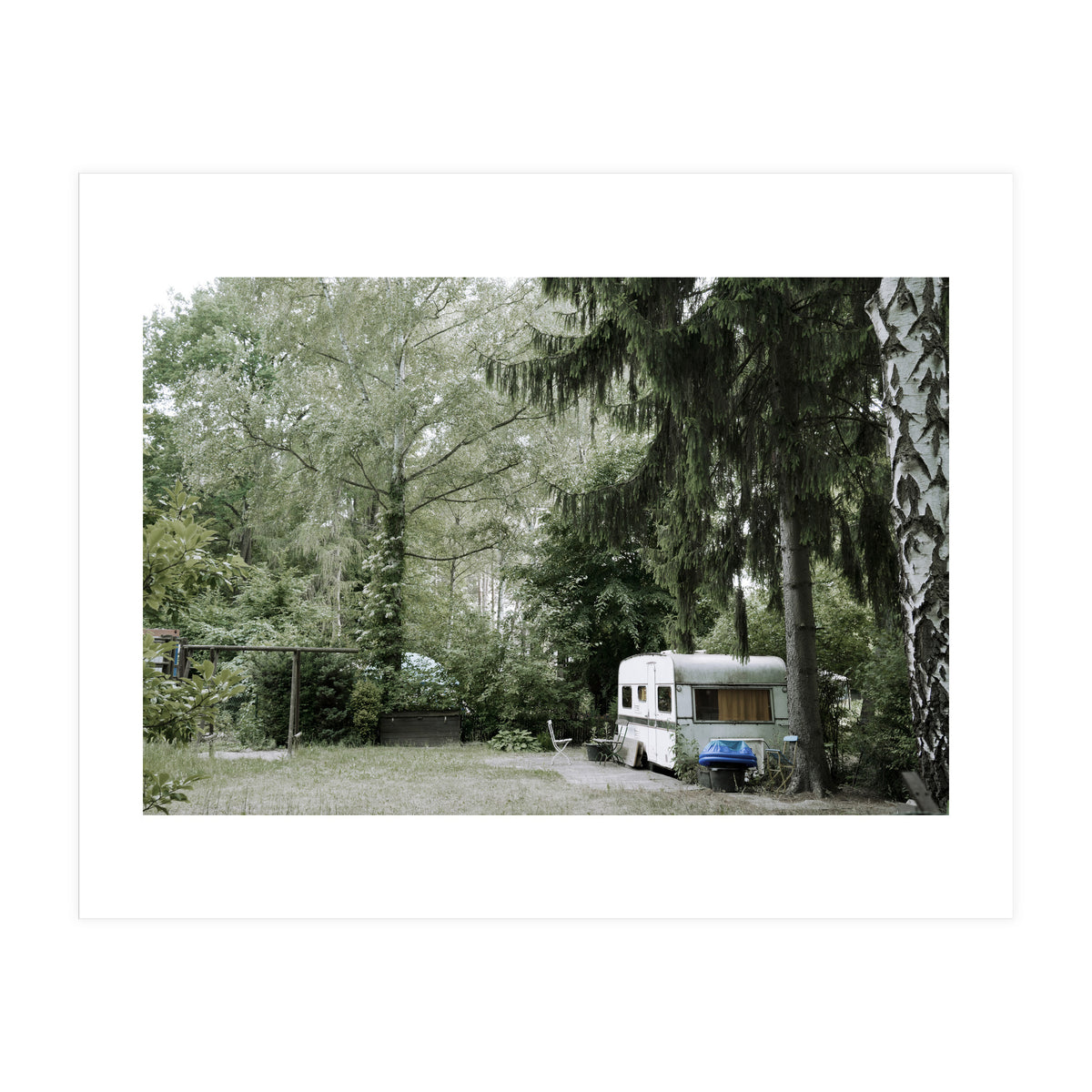 Travel trailer in the green garden (Print Only)