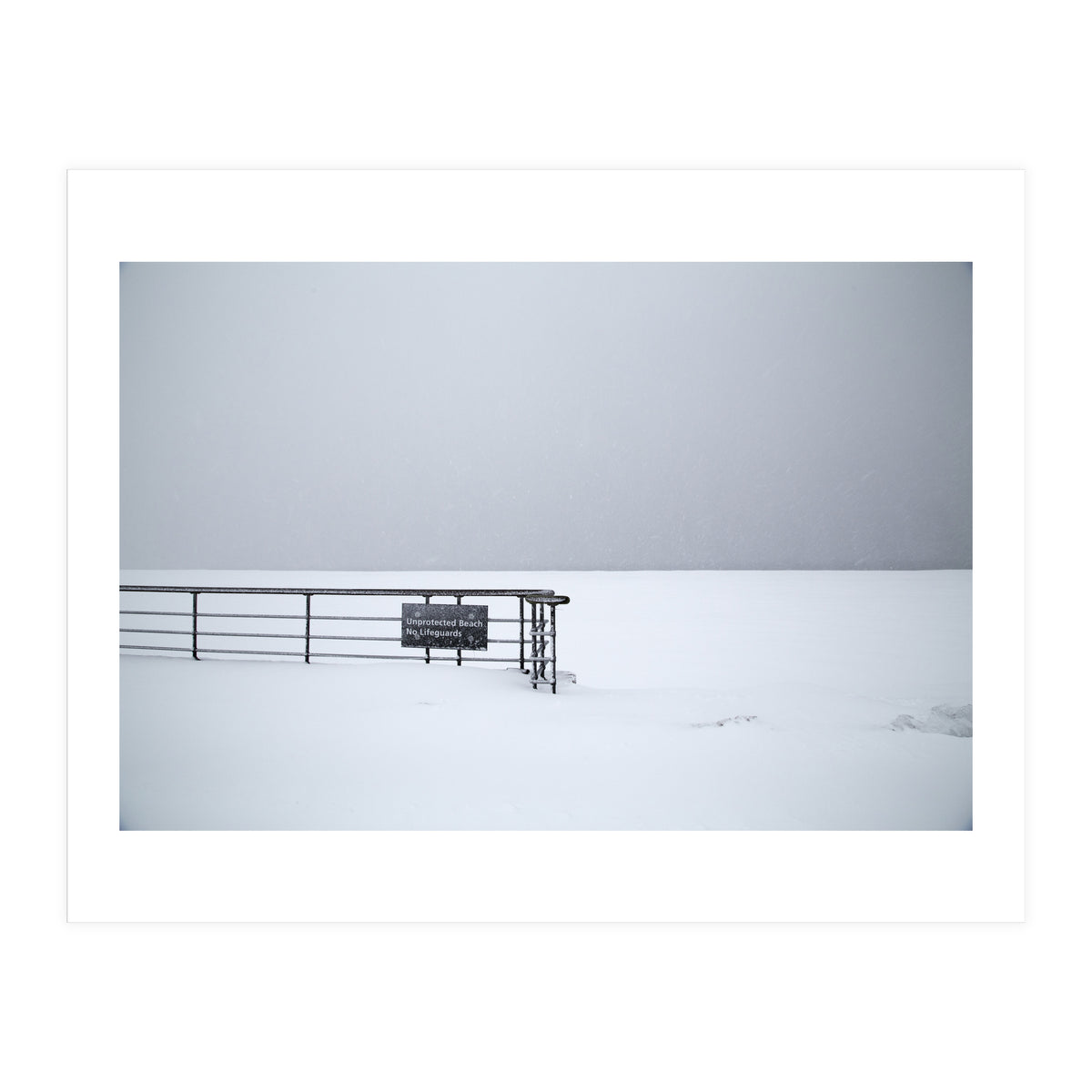 No lifeguards on the sign board in the winter snow beach (Print Only)