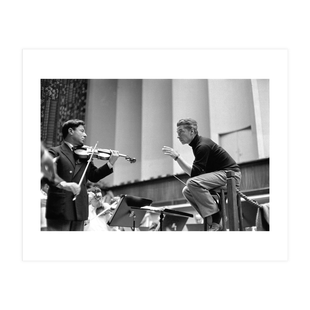 Conductor Herbert von Karajan rehearsing with Nathan Milstein in Lucerne, Switzerland. Lucerne,1957. (Print Only)