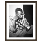 Jazz trumpeter Miles Davis early in his career playing in New York City, circa 1955. thumbnail