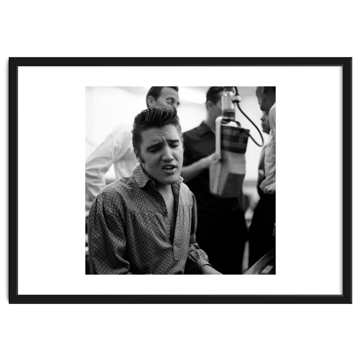 The American singer Elvis Presley during a recording session in 1956.