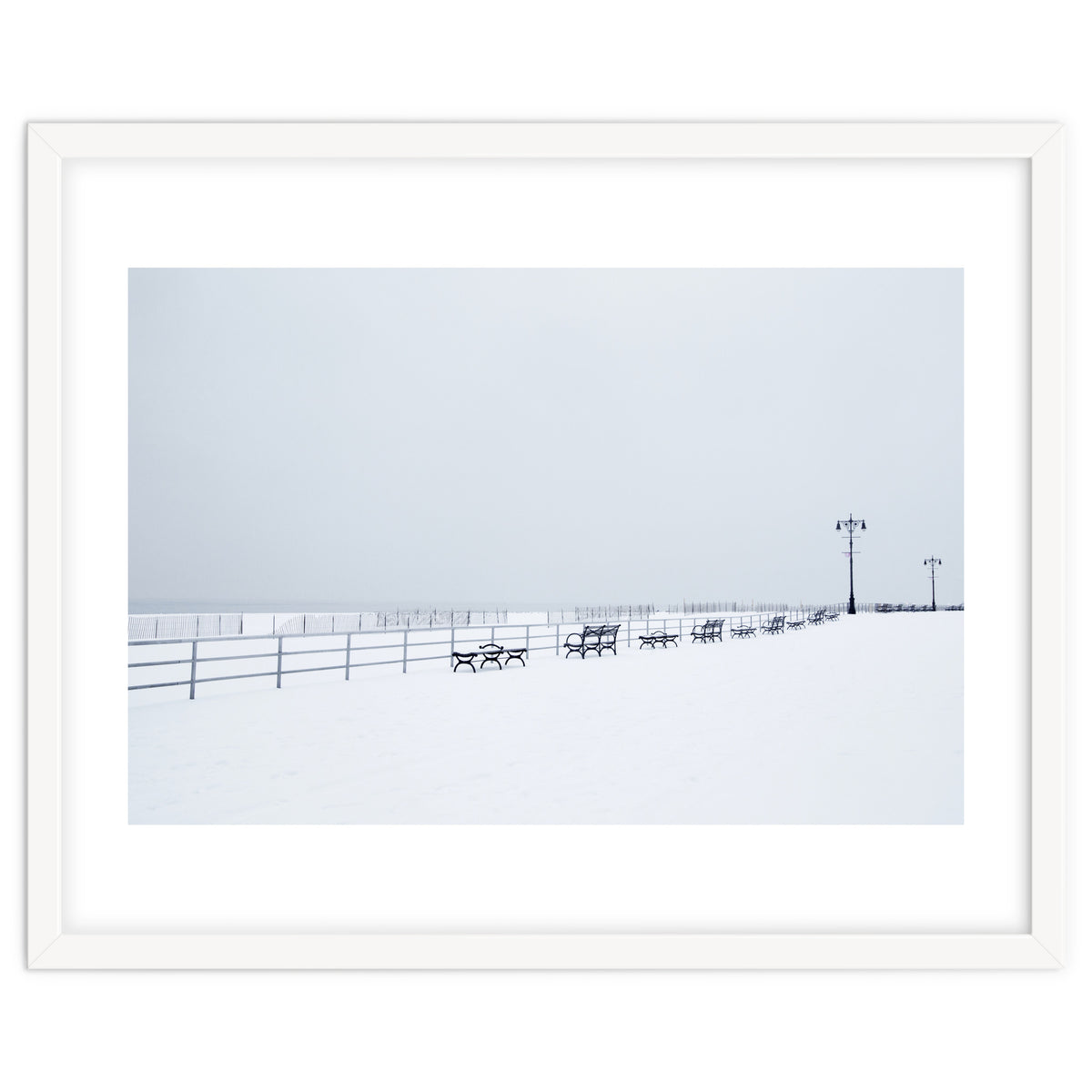 Benches along the pier on snow beach