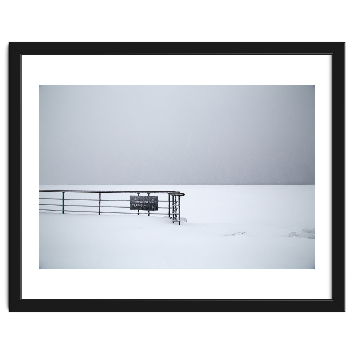 No lifeguards on the sign board in the winter snow beach