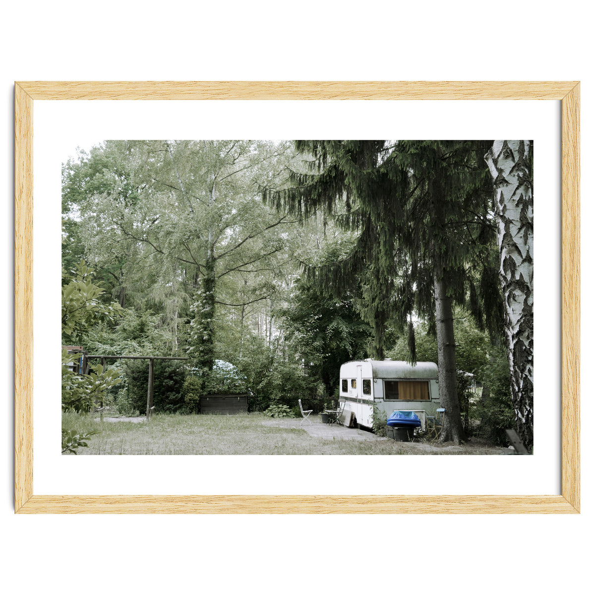 Travel trailer in the green garden