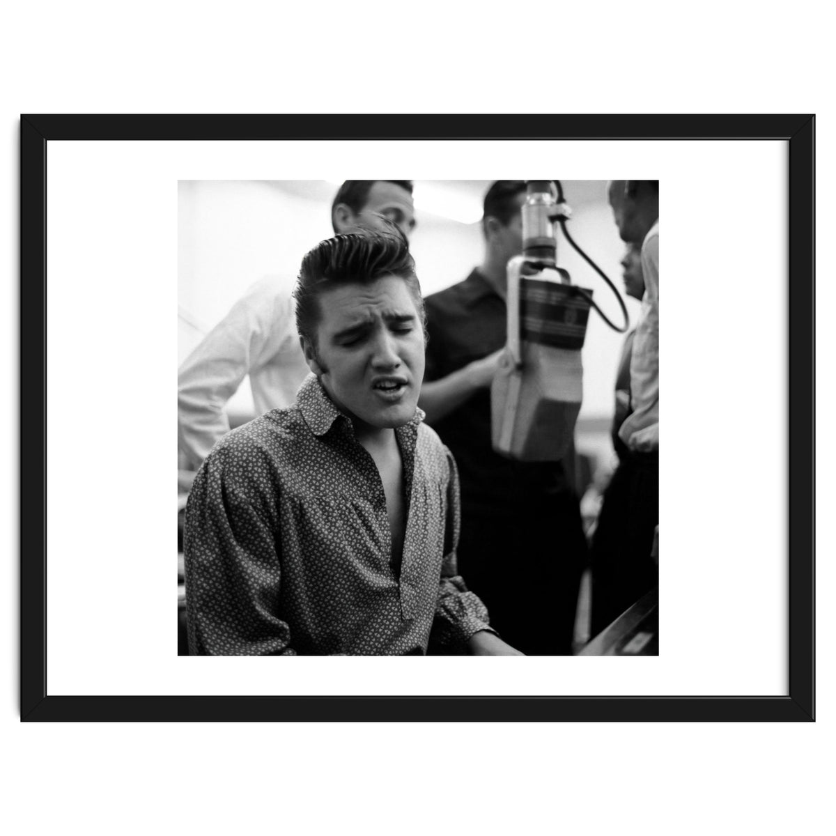 The American singer Elvis Presley during a recording session in 1956.