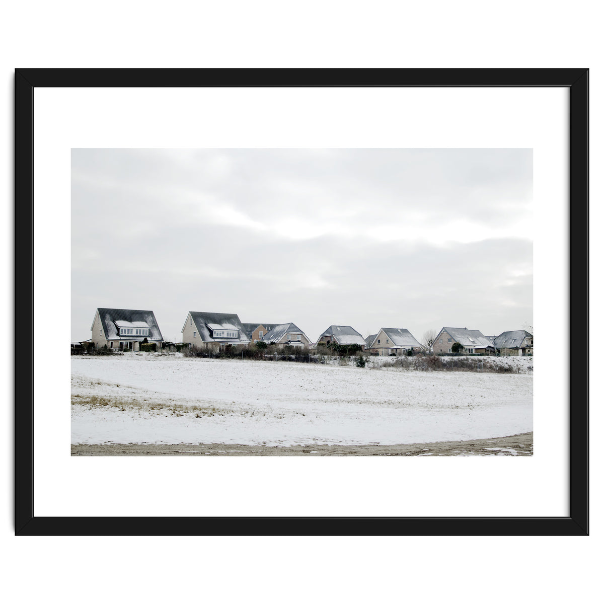 Snow covered houses on the hill