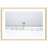 Fake palm tree in the winter snow beach thumbnail