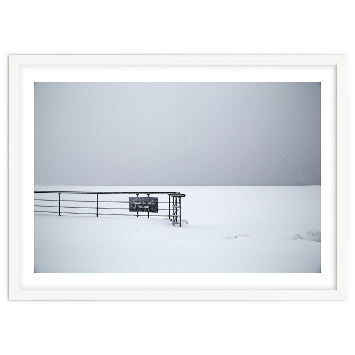 No lifeguards on the sign board in the winter snow beach