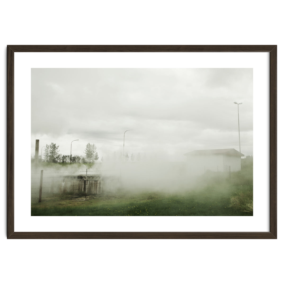 A source covered in steam from a hot spring - Iceland