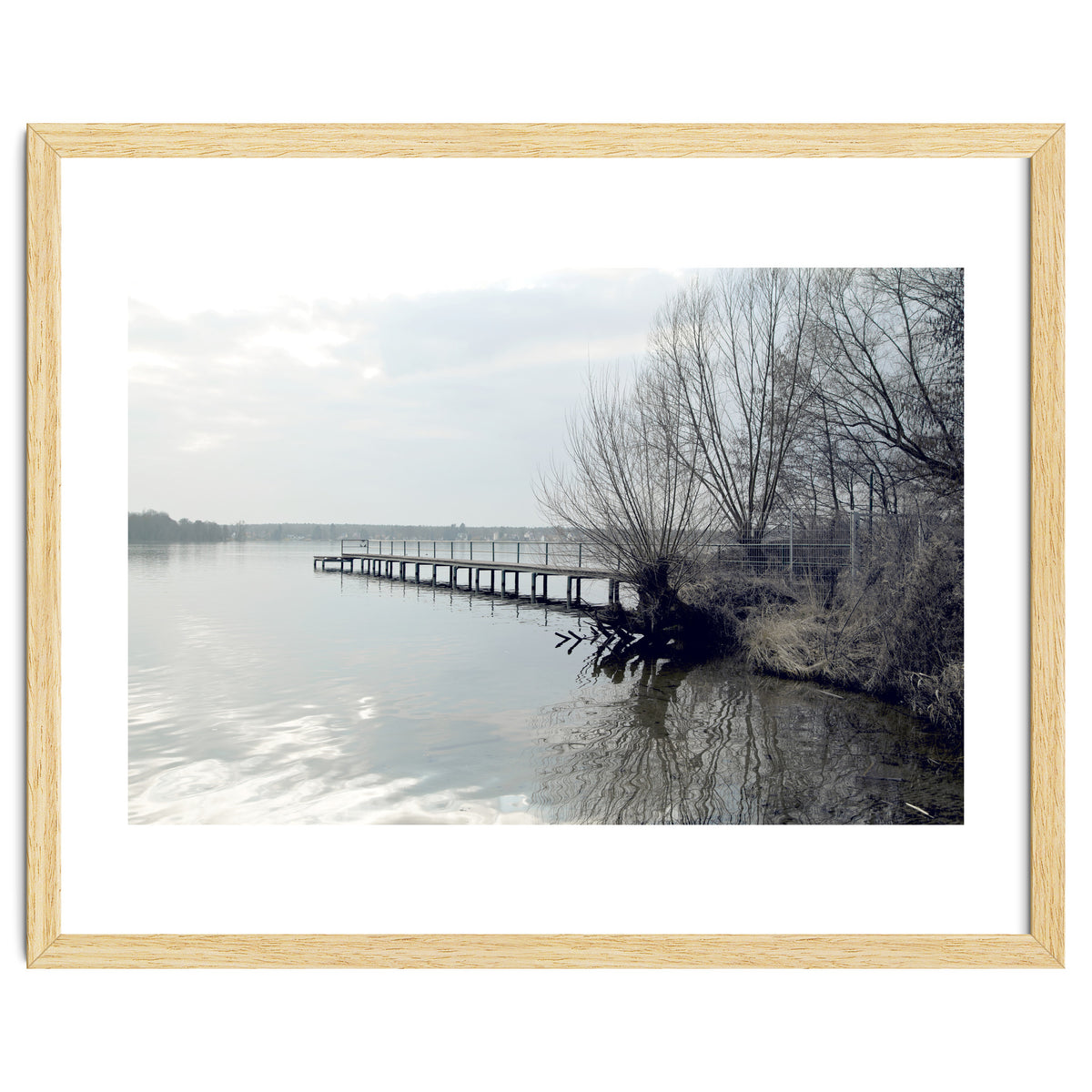 Sunny day pier in the lake