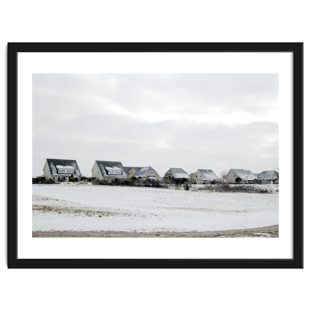 Snow covered houses on the hill