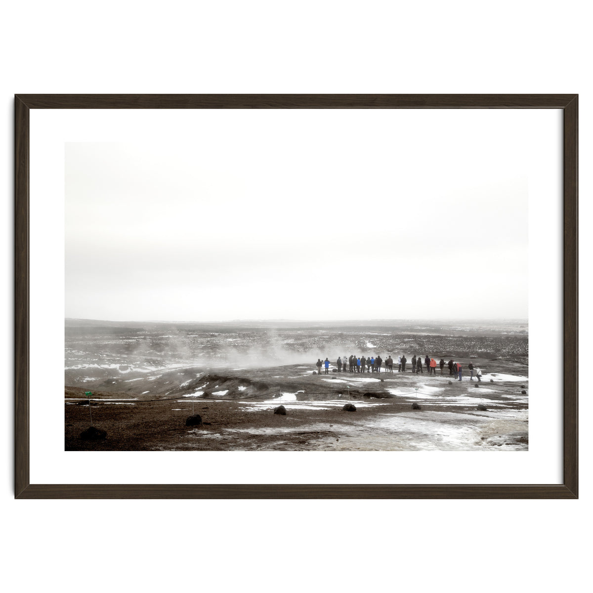 Tourists looking at the geyser - Iceland
