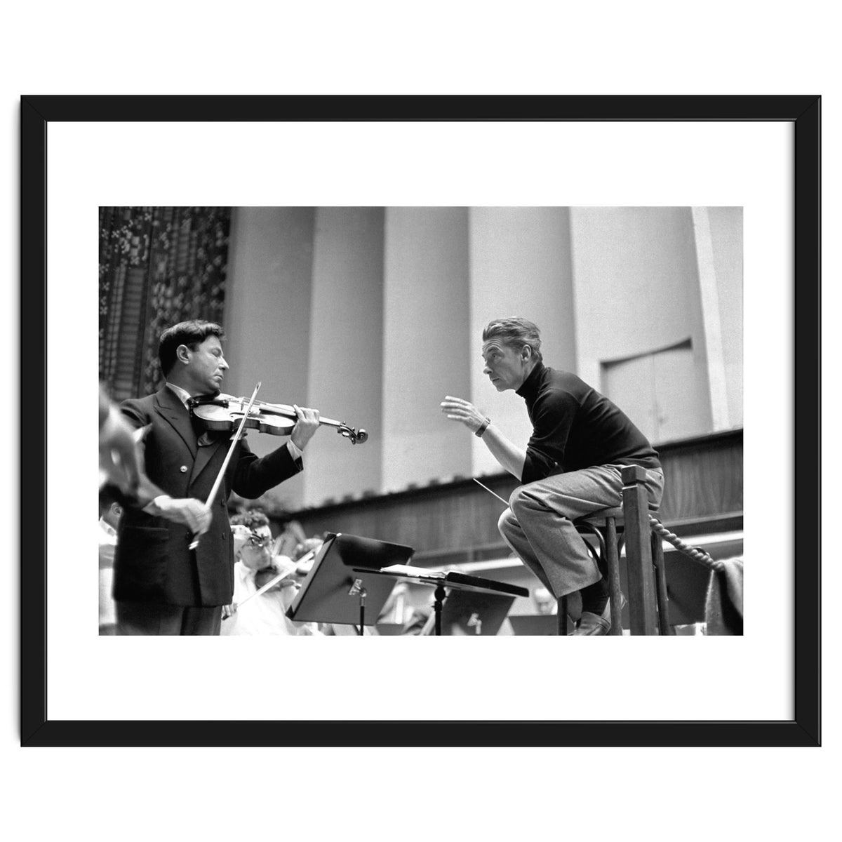 Conductor Herbert von Karajan rehearsing with Nathan Milstein in Lucerne, Switzerland. Lucerne,1957.