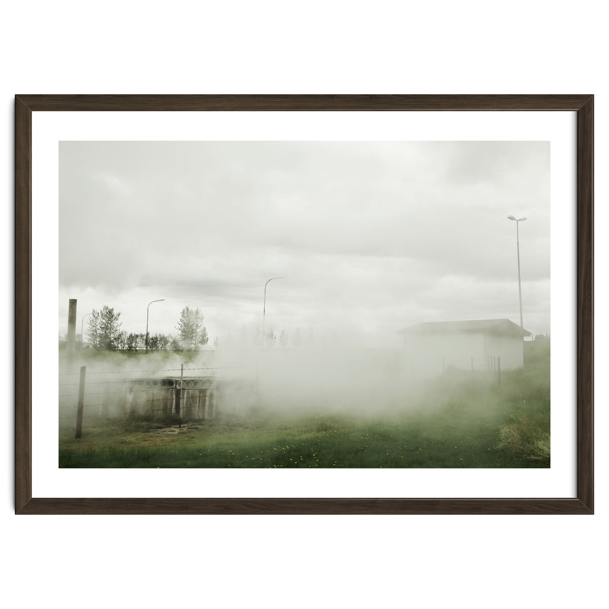 A source covered in steam from a hot spring - Iceland