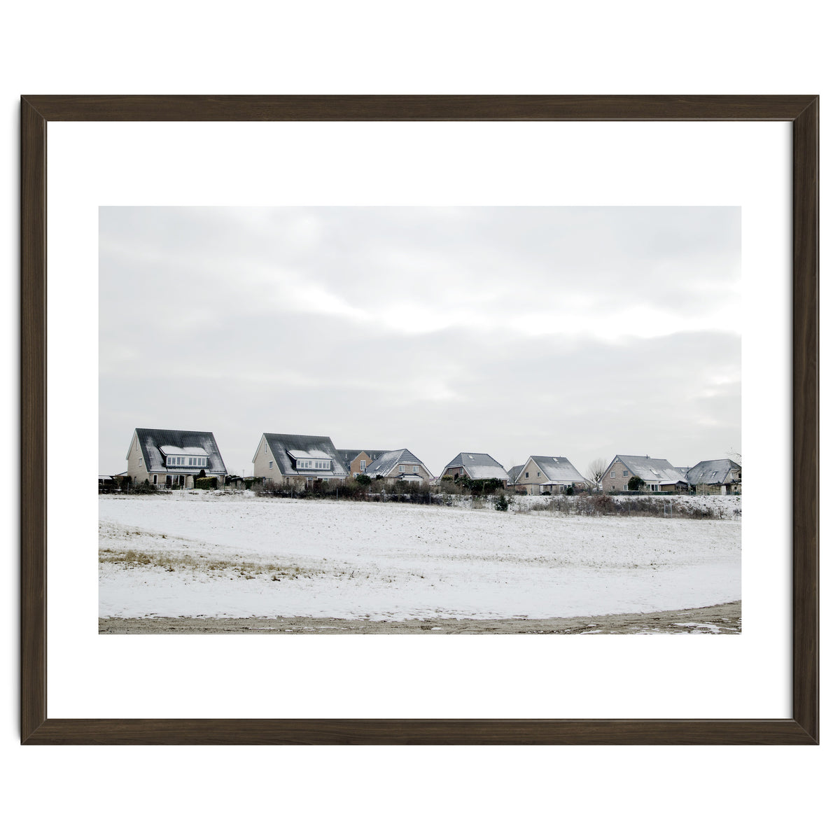 Snow covered houses on the hill