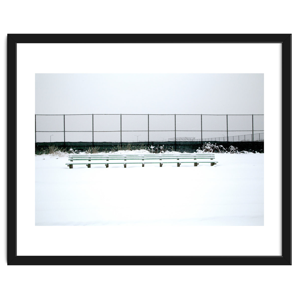 Bench with no people in snowy winter