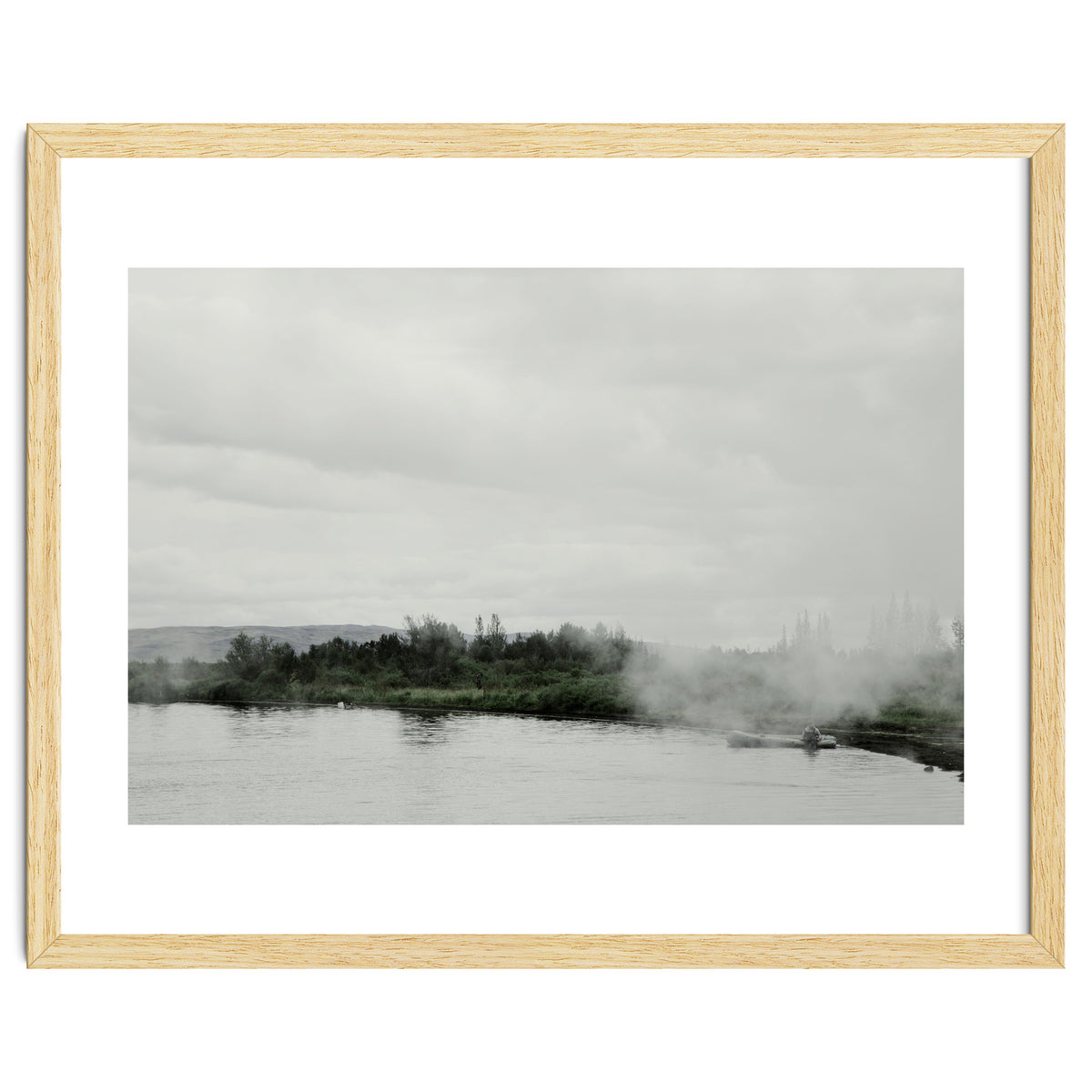 A boy on the boat in the geothermal lake - Iceland