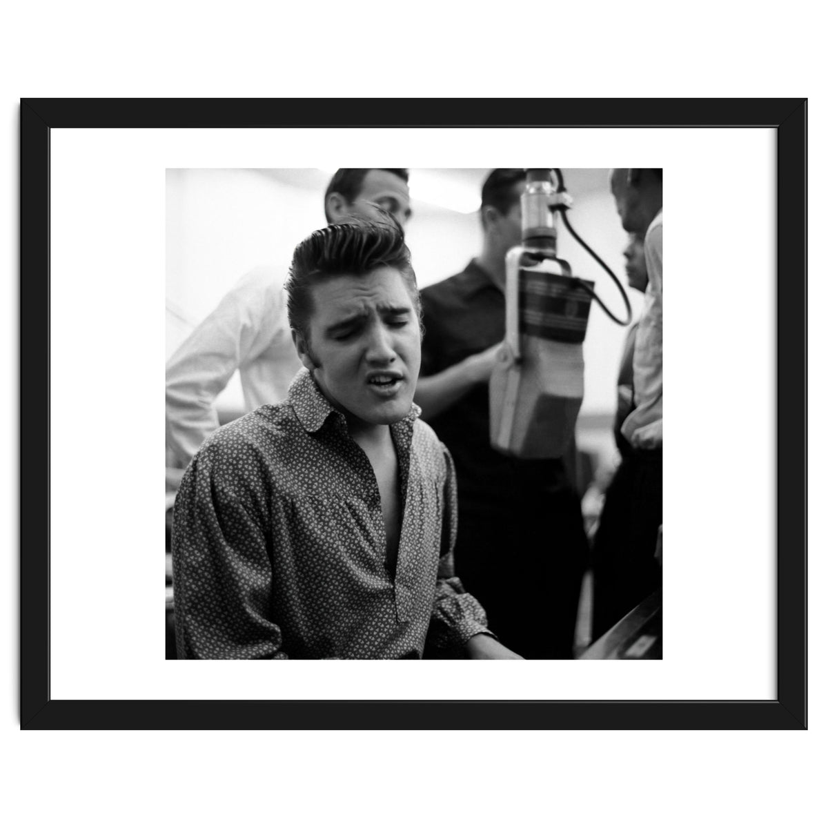 The American singer Elvis Presley during a recording session in 1956.