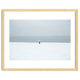 A walking woman in the winter snow beach thumbnail