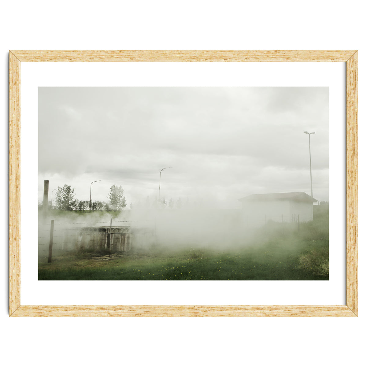 A source covered in steam from a hot spring - Iceland